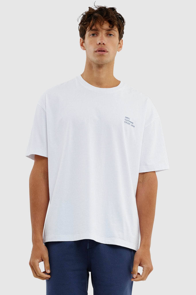 White boxy tshirt with navy ortc clothing co est 2016 logo