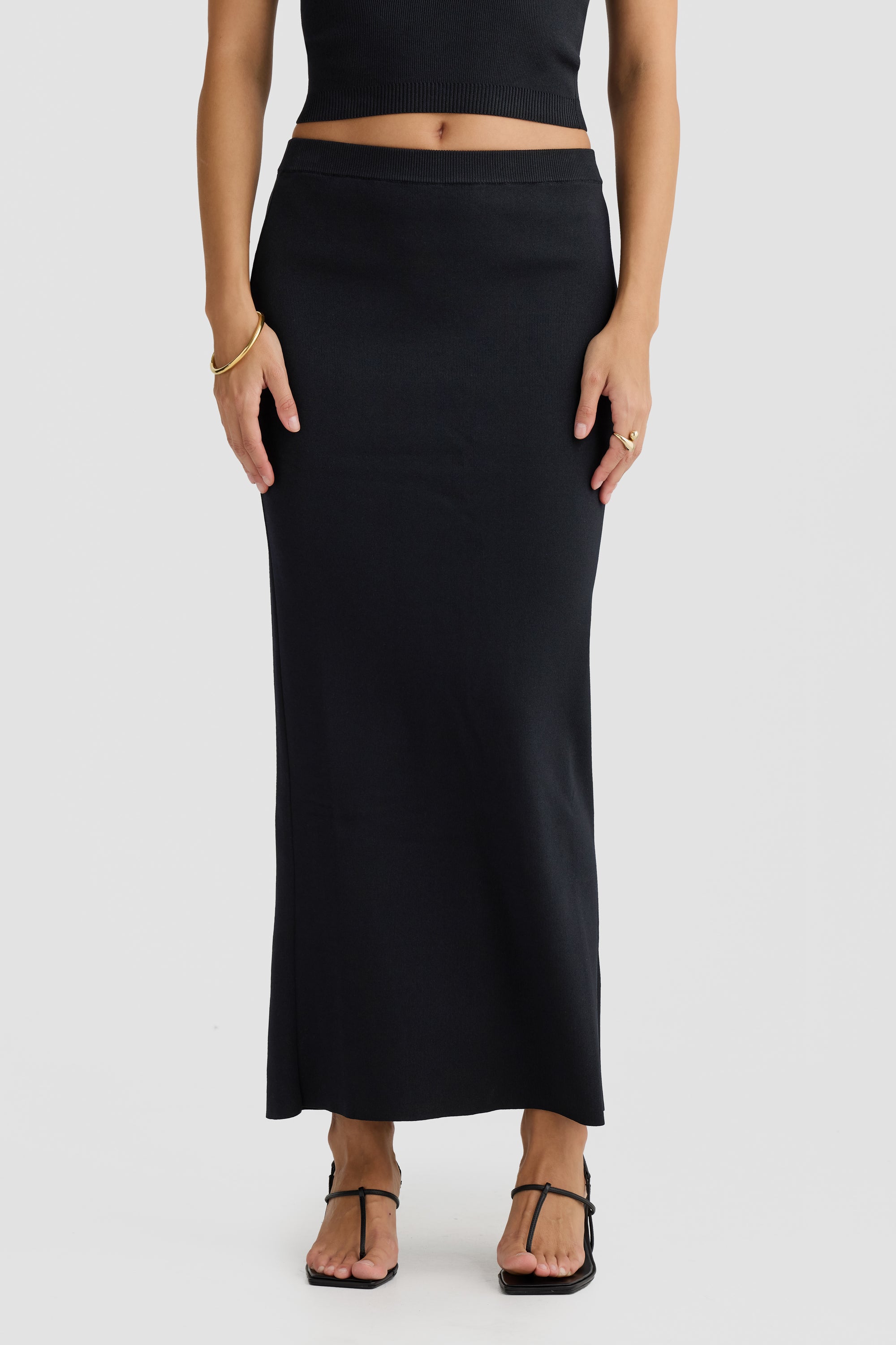 Womens long black knit skirt sales
