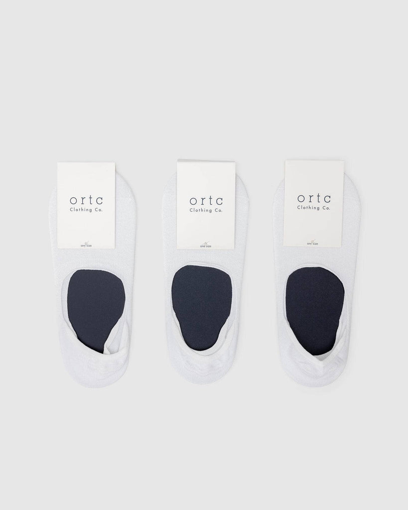 3 white no show socks with ortc tag
